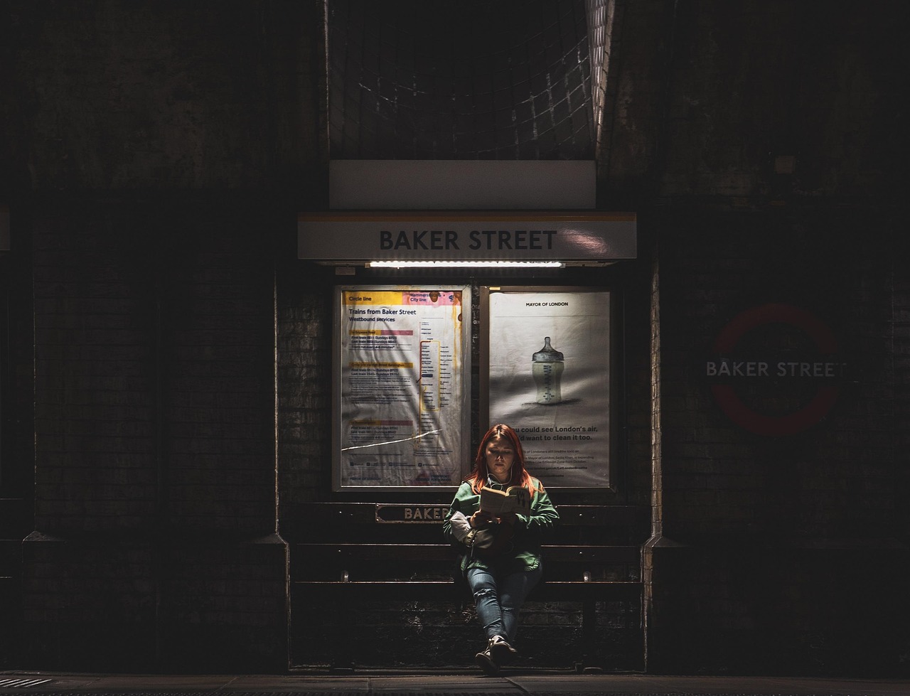 London Underground tube station platform with arriving train